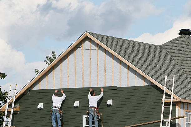 Professional Storm Damage Siding Repair technician working in Cameron, NC